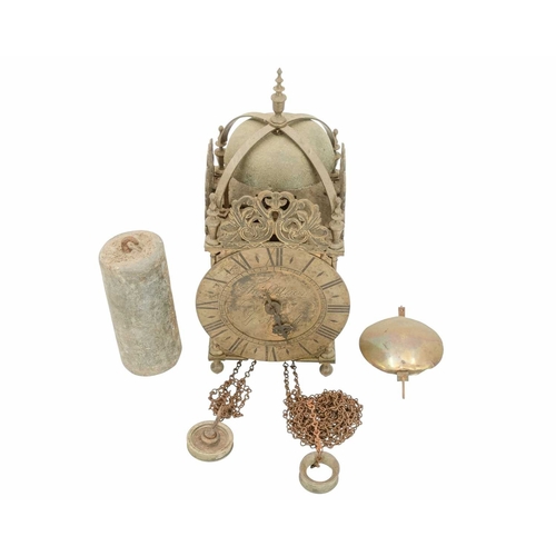 903 - A brass weight driven lantern clock, signed Thos Moore, Ipswich. 19th century, in the 17th century s... 