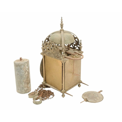 903 - A brass weight driven lantern clock, signed Thos Moore, Ipswich. 19th century, in the 17th century s... 