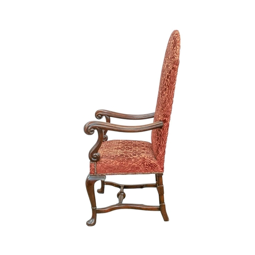 927 - A George I style walnut framed armchair. With an arched back, scroll end arms, and cabriole legs wit... 