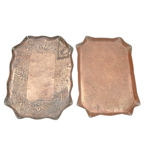 94 - Two Arts and Crafts copper trays. Both with wavy rims, one repousse decorated with leaves and Celtic... 