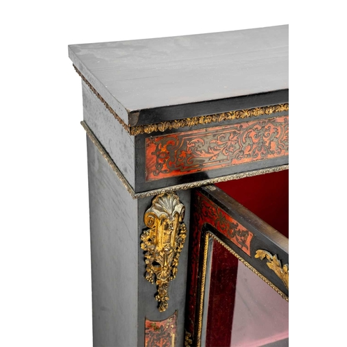 954 - A French brass inlaid Boulle style side cabinet. 19th century, with a glazed door and applied brass ... 