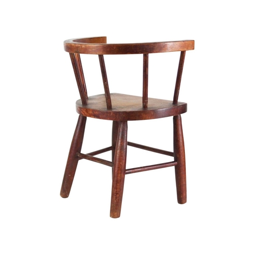 957 - A beech and ash child's stick back chair. First quarter 20th century, with a solid seat and turned l... 
