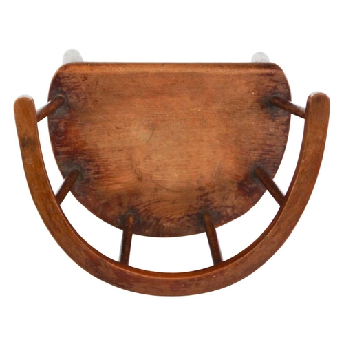 957 - A beech and ash child's stick back chair. First quarter 20th century, with a solid seat and turned l... 