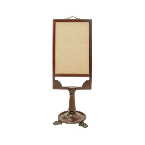 961 - A William IV rosewood table screen. With a floral embroidered rising woolwork panel, on a plain turn... 