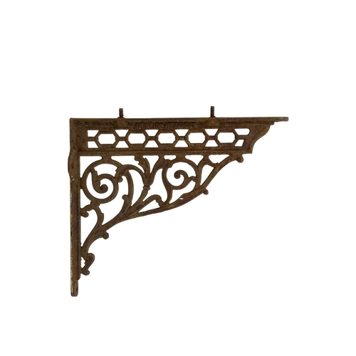 97 - A pair of Victorian cast iron shelf brackets. Height 28cm, depth 35cm.