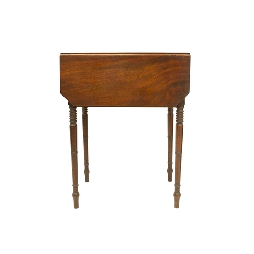 981 - An early Victorian mahogany work table. The well figured top with two leaves above two drawers and a... 