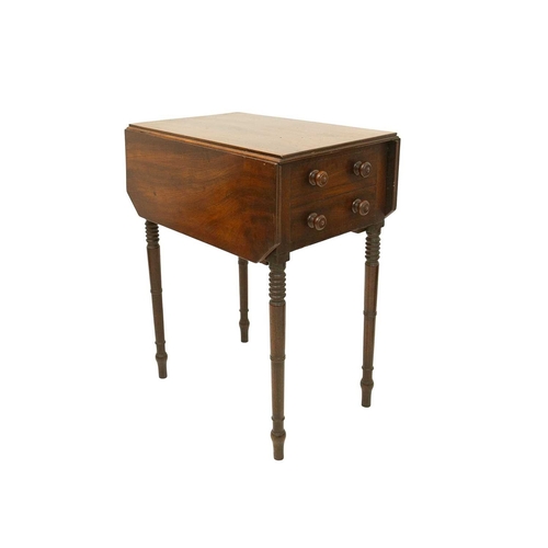981 - An early Victorian mahogany work table. The well figured top with two leaves above two drawers and a... 