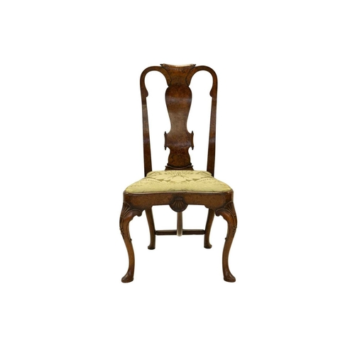 983 - A pair of Queen Anne style walnut chairs. 19th century, the well figured burr veneered backs with pa... 
