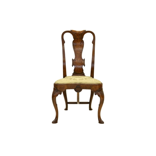 983 - A pair of Queen Anne style walnut chairs. 19th century, the well figured burr veneered backs with pa... 