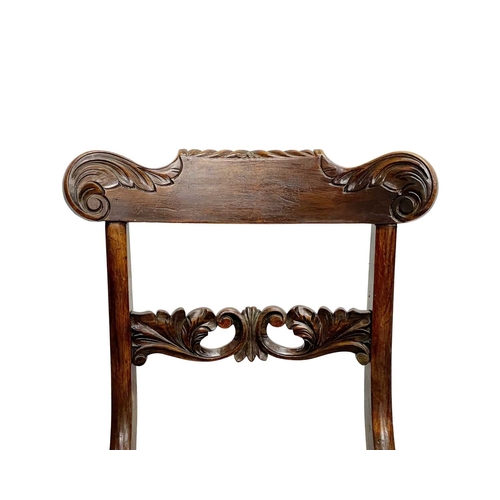 984 - A set of six Regency simulated rosewood dining chairs. With carved top and mid rails, drop-in seat f... 