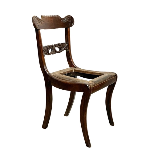 984 - A set of six Regency simulated rosewood dining chairs. With carved top and mid rails, drop-in seat f... 