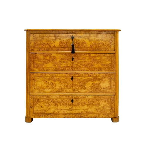 985 - A Biedermeier satin birch secretaire chest. 19th century, the hinged fall fitted a central cupboard,... 