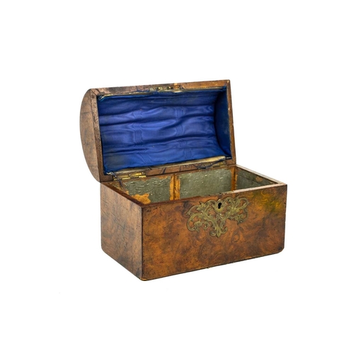 119 - A Victorian figured walnut dome top tea caddy. With a shaped cut brass handle and mounts, lacks inte... 