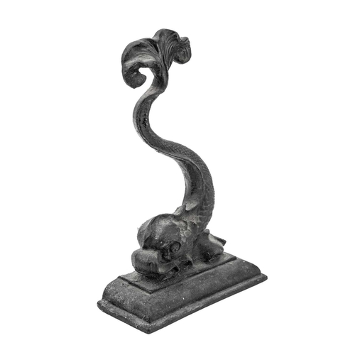 14 - A Victorian black painted cast iron door stop in the form of a stylised dolphin. Height 36.5cm, toge... 