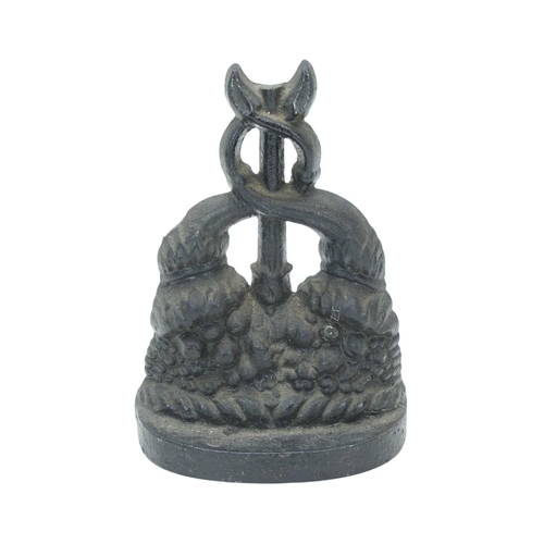 14 - A Victorian black painted cast iron door stop in the form of a stylised dolphin. Height 36.5cm, toge... 