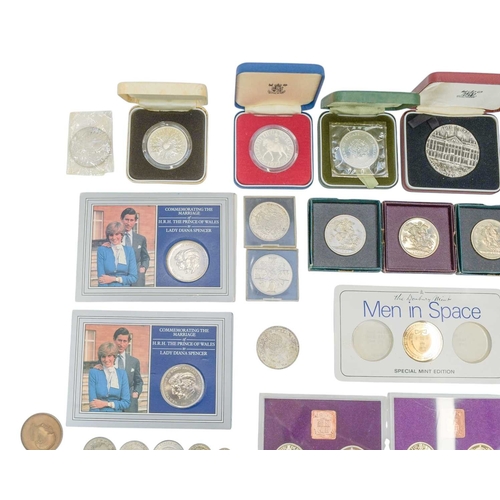 189 - Great Britain and World Coins including silver coins. Lot includes:Three silver proof cased Great Br... 