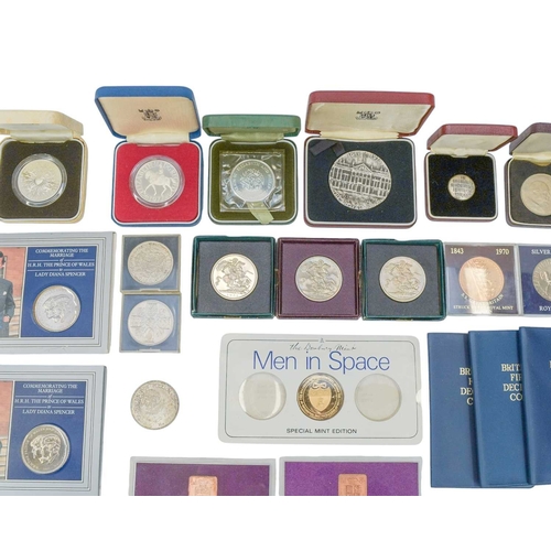 189 - Great Britain and World Coins including silver coins. Lot includes:Three silver proof cased Great Br... 