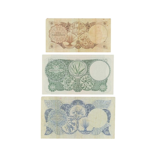 202 - East African Currency Board Bank Notes QE2 x3. Lot comprises: 1964 issue 5 shilling, 10 shilling, 20... 