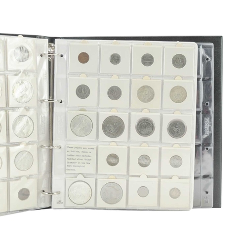 208 - Coin Collection in Album. Lot includes a USA 1992 silver dollar and a 1928 Peace Dollar, together wi... 