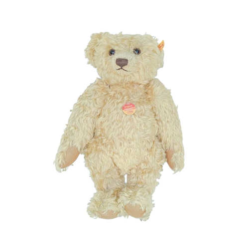 219 - A Steiff 'Original Classic' teddy bear. Blond mohair and growler, with original labels dated 2003, h... 