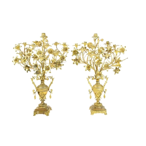 22 - A pair of ornate large French gilt metal candelabra. 19th century, modelled as multiple flowerheads ... 