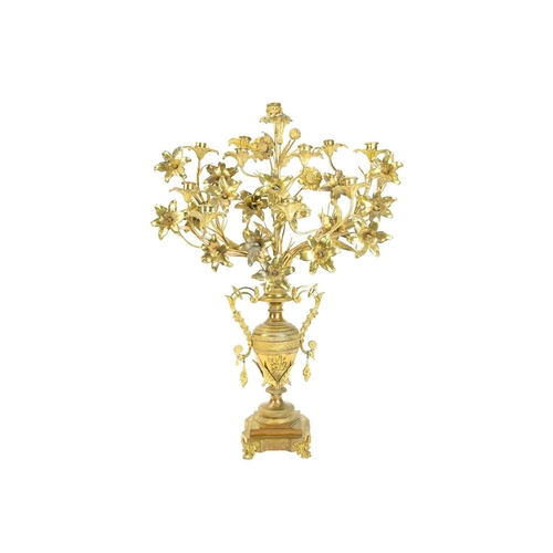 22 - A pair of ornate large French gilt metal candelabra. 19th century, modelled as multiple flowerheads ... 