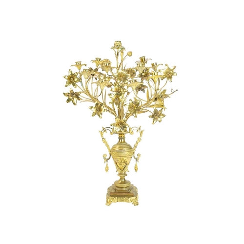 22 - A pair of ornate large French gilt metal candelabra. 19th century, modelled as multiple flowerheads ... 