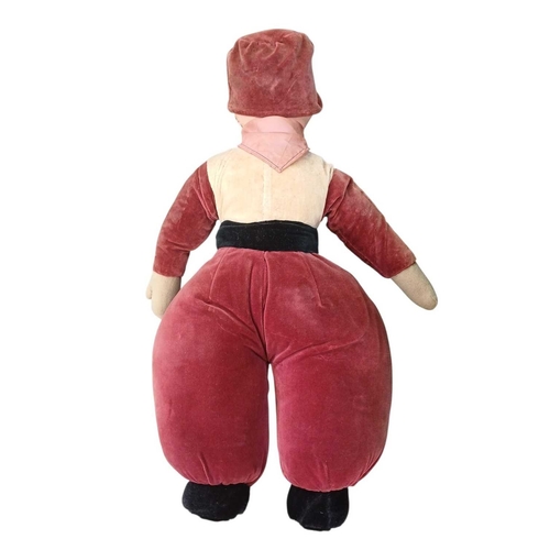 220 - A large vintage Dutch boy doll. Cloth doll with a painted pressed card head, velvet clothing and moh... 