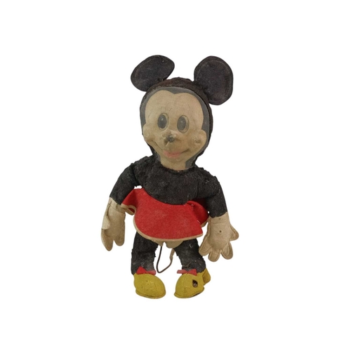 221 - A Merrythought Disney 'Minnie Mouse' soft toy. The maker's label sewn onto one shoe. Height 30cm.