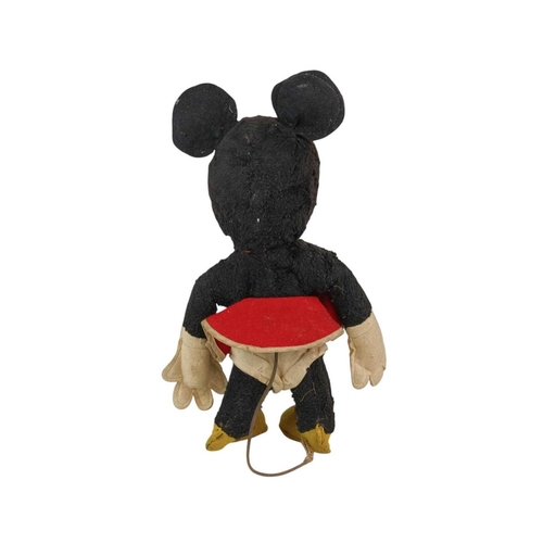 221 - A Merrythought Disney 'Minnie Mouse' soft toy. The maker's label sewn onto one shoe. Height 30cm.