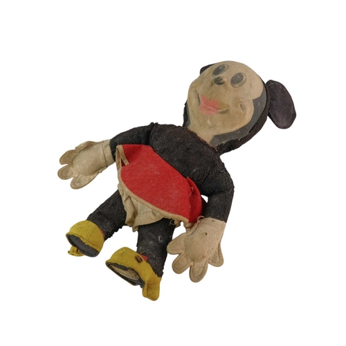 221 - A Merrythought Disney 'Minnie Mouse' soft toy. The maker's label sewn onto one shoe. Height 30cm.
