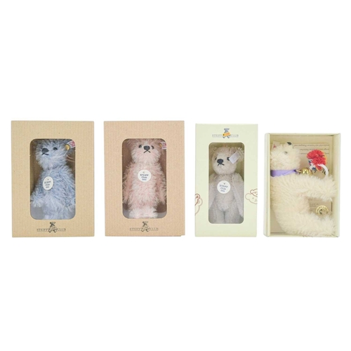 222 - Eight Steiff Club teddy bears. A collection of bears in their original boxes with paperwork, ranging... 