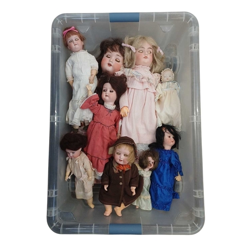 224 - A collection of early 20th century dolls. Comprising an Armand Marseille doll, with bisque head, bru... 
