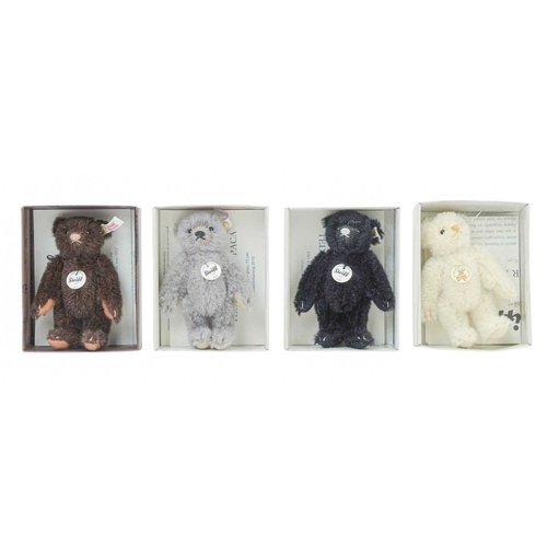 225 - Seven Steiff Club teddy bears. A collection of bears in their original boxes with paperwork, ranging... 