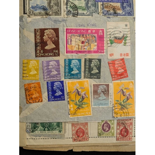 243 - A QV - QEII early Rowland Hill Postage Stamp Album. This well-filled album has a range of Commonweal... 