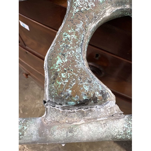 26 - A copper weathervane. modelled as a hollow fox above the compass points, length 82cm. Ex Gwel An Mor... 