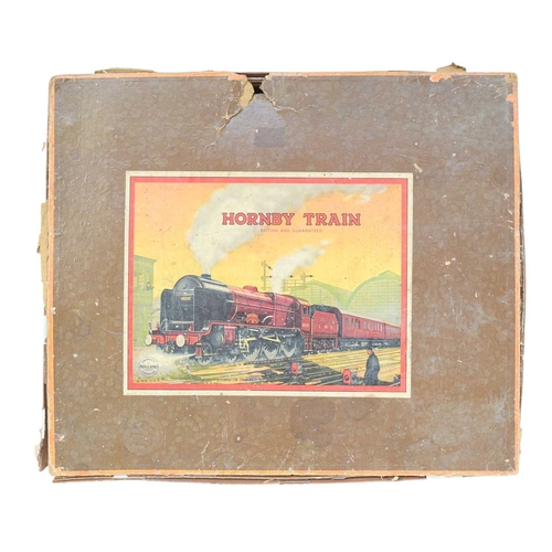 261 - Hornby O gauge Riviera Blue clockwork train set. Comprising Nord loco & tender, all brown, with smok... 
