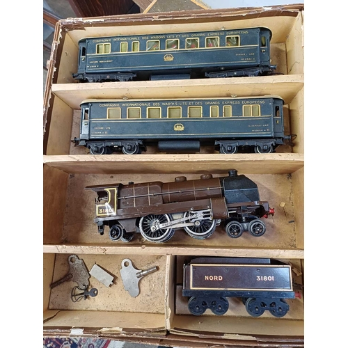 261 - Hornby O gauge Riviera Blue clockwork train set. Comprising Nord loco & tender, all brown, with smok... 