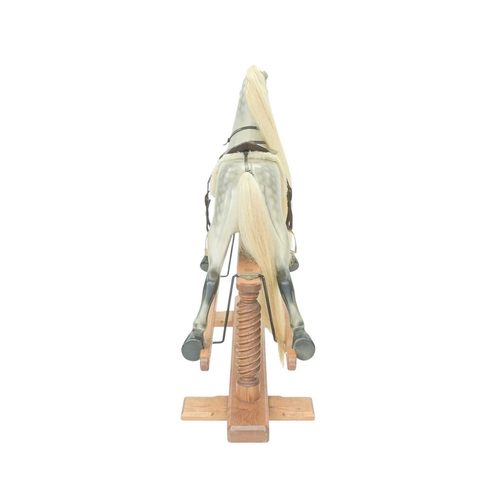 264 - A hand-carved rocking horse by Geoff Martin of Horsecraft, Redruth. Dapple grey, with horsehair mane... 