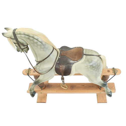 264 - A hand-carved rocking horse by Geoff Martin of Horsecraft, Redruth. Dapple grey, with horsehair mane... 