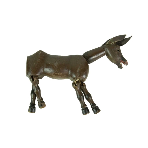 267 - A Lehmann tin plate Balky Mule clockwork tinplate toy. In poor condition, together with other toys, ... 