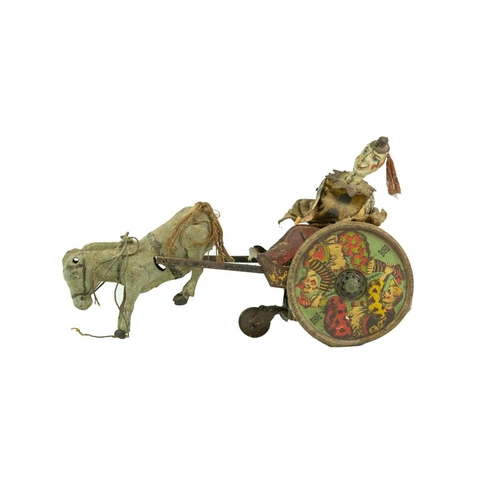 267 - A Lehmann tin plate Balky Mule clockwork tinplate toy. In poor condition, together with other toys, ... 