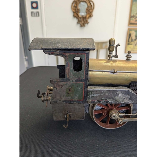 268 - A Bing Gauge 1 live steam 2-2-0 locomotive. Circa 1910, with a brass boiler and traces of red lined ... 