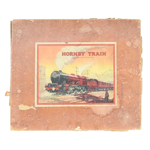 271 - A Hornby O gauge Golden Arrow Pullman clockwork train set. With Southern green painted Lord Nelson N... 