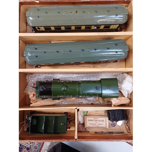 271 - A Hornby O gauge Golden Arrow Pullman clockwork train set. With Southern green painted Lord Nelson N... 