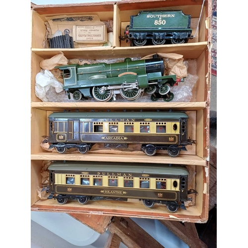 271 - A Hornby O gauge Golden Arrow Pullman clockwork train set. With Southern green painted Lord Nelson N... 