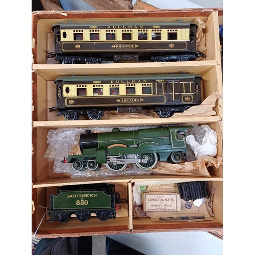 271 - A Hornby O gauge Golden Arrow Pullman clockwork train set. With Southern green painted Lord Nelson N... 