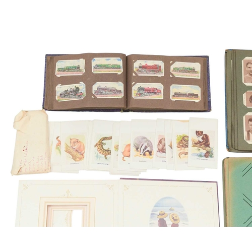 281 - Cigarette Cards etc. Lot comprises two albums of cigarette cards including earlier examples, mainly ... 