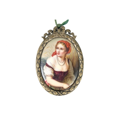 289 - A continental painted porcelain plaque. Circa 1900, decorated an elegant woman amidst reeds, 8 x 6cm... 