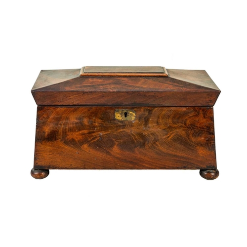 32 - An early Victorian sarcophagus shape tea caddy. Fitted with twin internal lidded compartments and a ... 